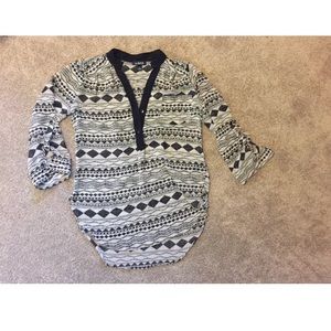 Quarter length tribal print button down top